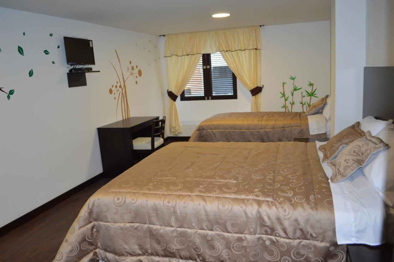 קואנקה Hostal Delia Victoria מראה חיצוני תמונה